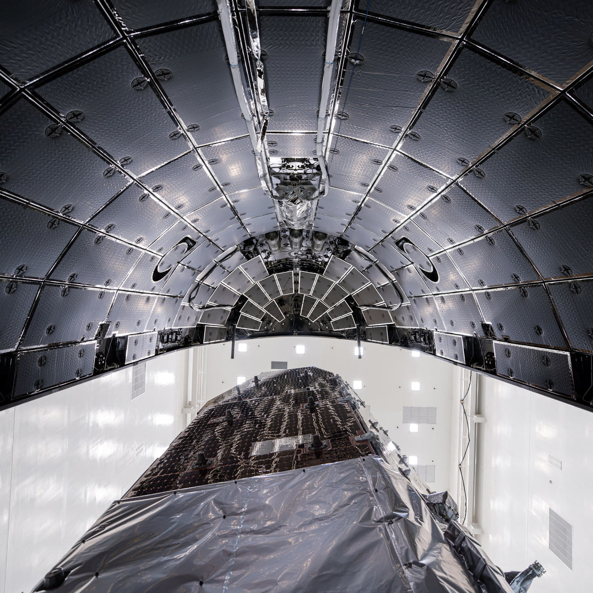 Roman. The Nancy Grace Roman Space Telescope under the Falcon Heavy acoustic tiles.